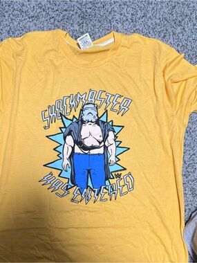HOMAGE WWE Shockmaster Yellow Graphic Short-Sleeve Tee with Blue Illustration